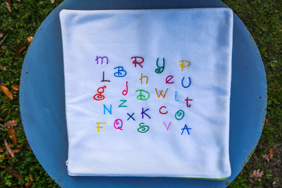 Housse de coussin polaire Alphabet